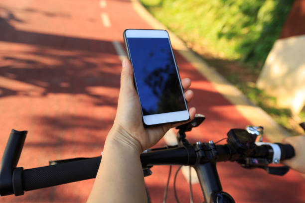 istock cyclist setting active camera before riding mountain bike on forest trail 668462808