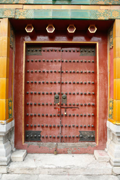 istock Door Knockers on Ancient Chinese Gates 668477010