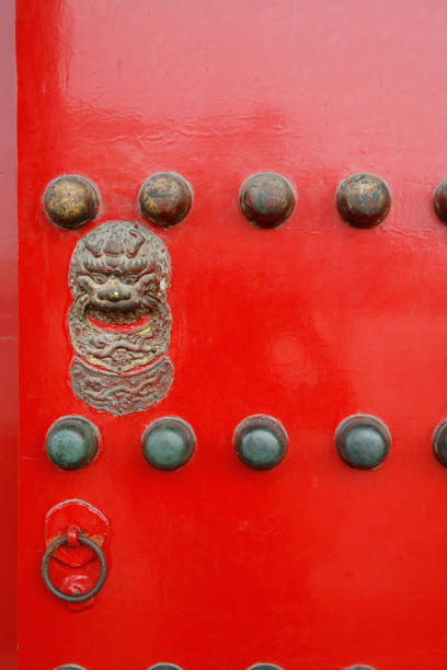 istock Door Knockers on Ancient Chinese Gates 668477014