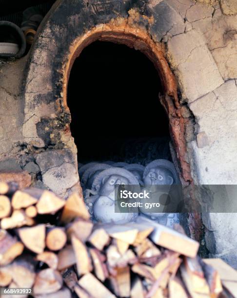 Raccoon Into The Kiln Stock Photo - Download Image Now - Raccoon Dog, Figurine, Kiln