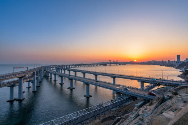 istock Dalian Cross-Sea Bridge at dusk 668500526