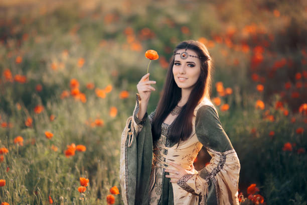 istock Medieval Princess in a Field of Poppies 668515536