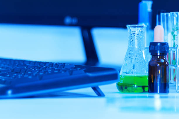 istock Laboratory glassware containing chemical liquid, science research,and science content. 668527144