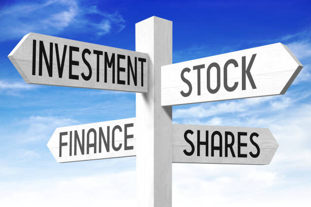 istock Finance concept - wooden signpost 668544666