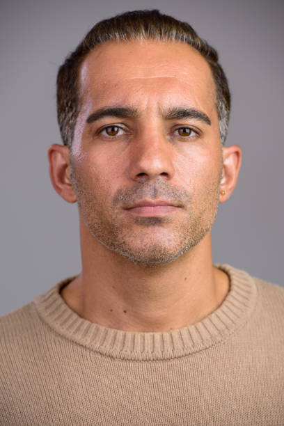 istock Face of mature handsome Persian man 668547244