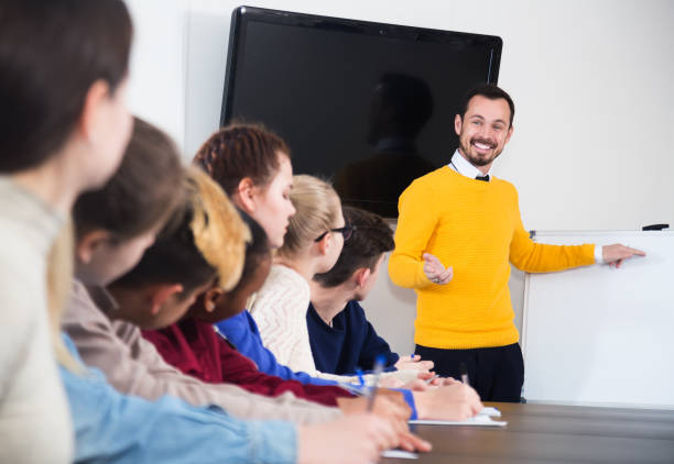 istock Students listening to teacher 668550136