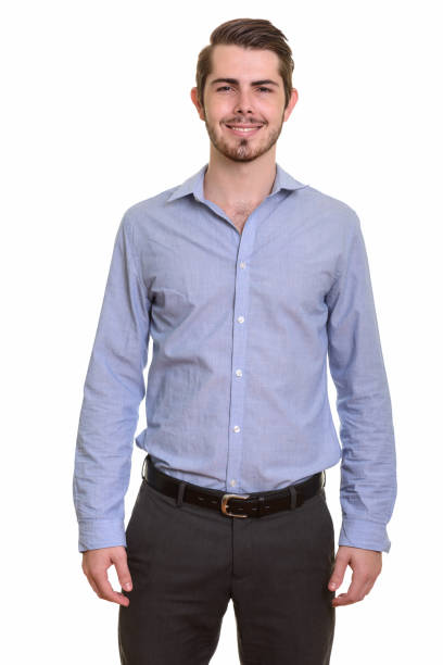 istock Happy young handsome businessman smiling and standing 668550778