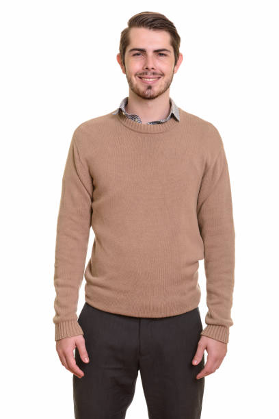 istock Happy young handsome man smiling and standing 668551046
