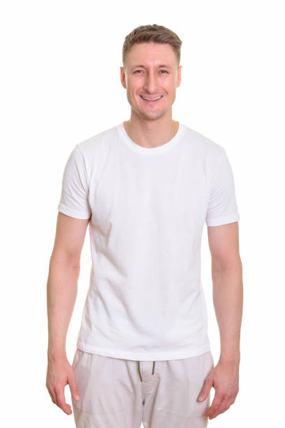 istock Studio shot of happy handsome man smiling while standing 668557772