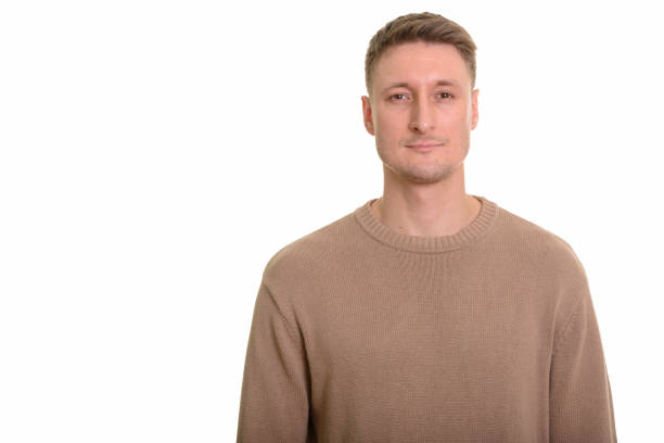 istock Studio shot of handsome man against white background 668558230