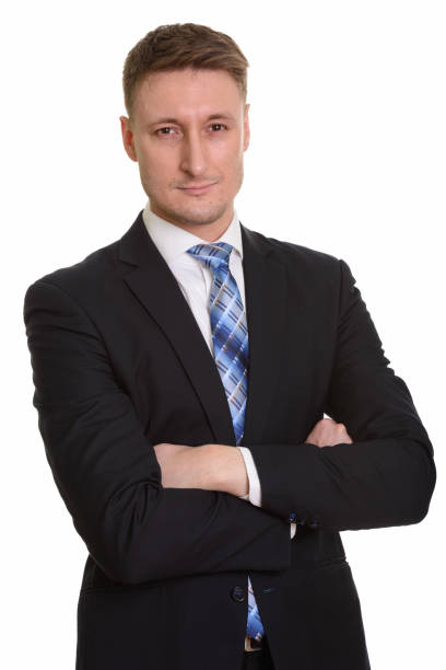 istock Studio shot of handsome businessman with arms crossed 668560708