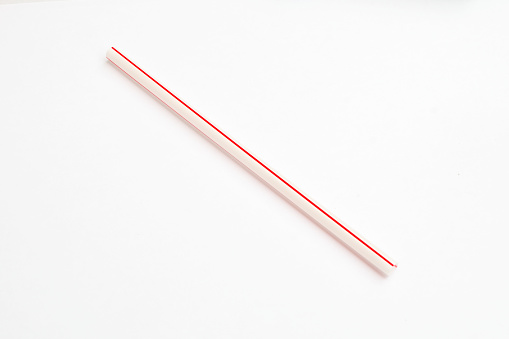 red straw for drinking isolated on white background