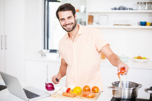istock A Man is cooking food 668562602