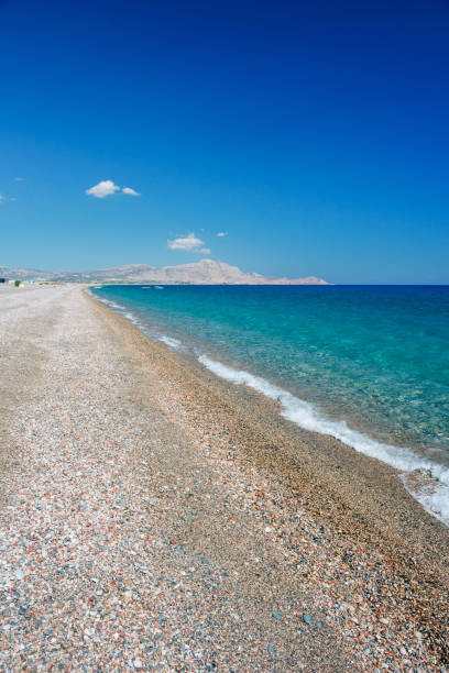 Sunny day over Afandou beach, Rhodes View of Afandou beach on sunny day, Rhodes, Greece afandou stock pictures, royalty-free photos & images