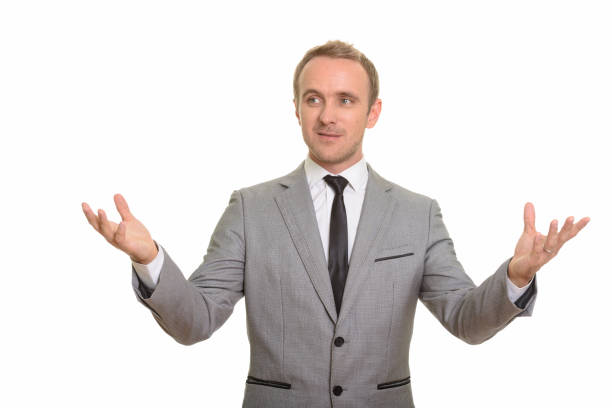 istock Handsome businessman giving speech with hand gestures 668572510
