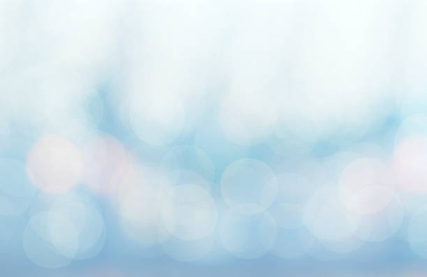 Abstract white blue and pink colors blurred bokeh light stock photo