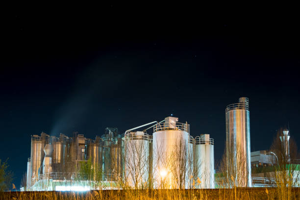 istock Illuminated Chemical Plant at night 668582618