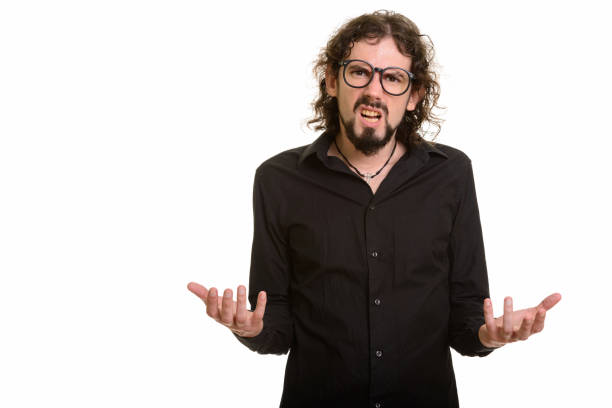 istock Handsome man looking upset with arms raised while wearing eyeglasses 668589136