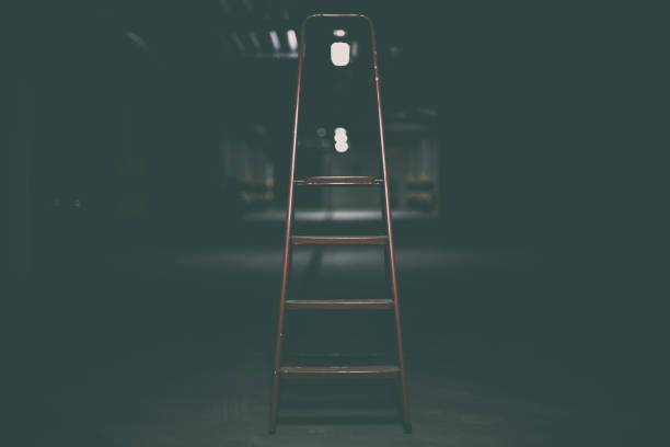 istock Red ladder in underground parking 668590568
