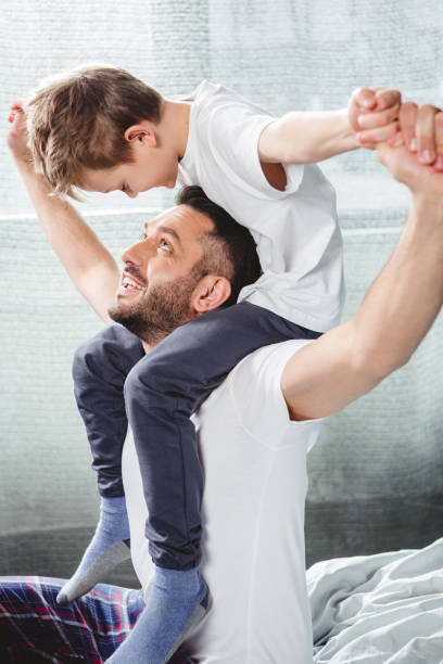 istock Father carrying son on neck 668593212