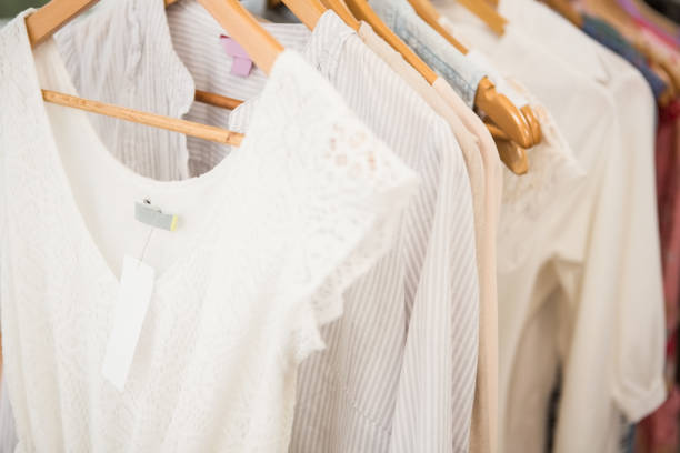 istock Clothes on clothes rail 668596634