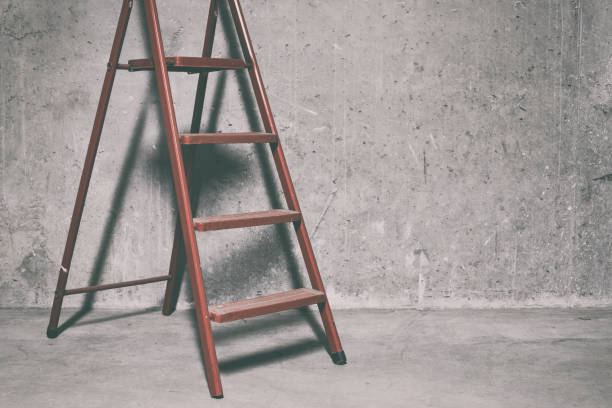 istock Red ladder in underground parking 668597062