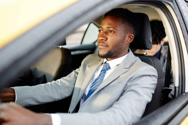 istock African Businessman Driving Car 668600020
