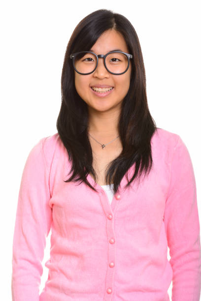 istock Young happy Asian woman smiling while wearing eyeglasses 668600126