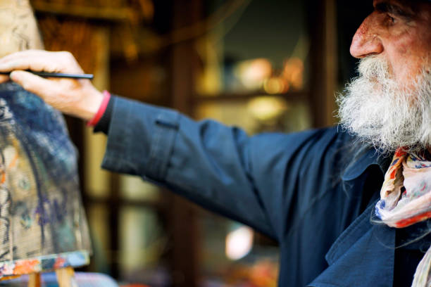 Portrait of an artistic painter in workshop