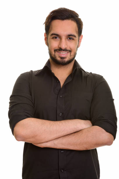 istock Young happy Indian man smiling with arms crossed 668616282
