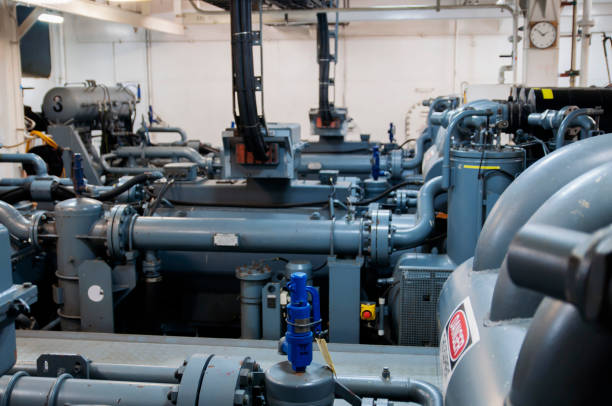 istock Heavy machinery on board industrial ship 668617540