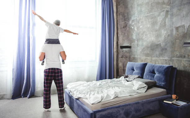 istock Father carrying son on neck 668624786