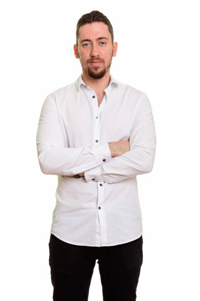 istock Young handsome businessman standing with arms crossed 668637638