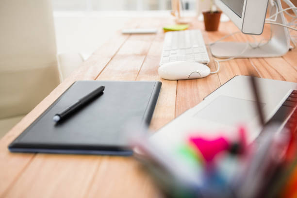 istock Close up view of digitizer on creative working desk 668637992