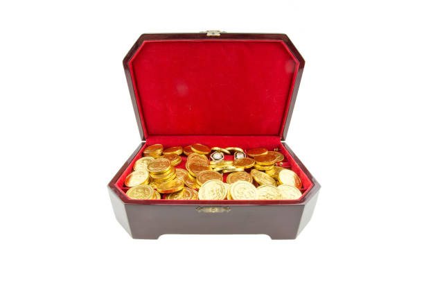 istock Golden coins in a chest 668638248