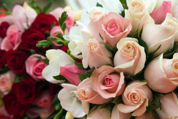 istock Pink and Red Rose Wedding Bouquet 668641584
