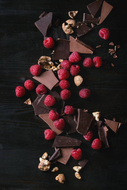 istock Variety of chopping chocolate with raspberries 668653484