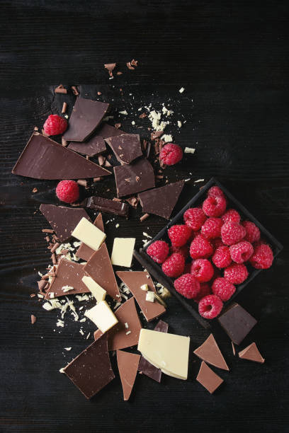 istock Variety of chopping chocolate with raspberries 668653486