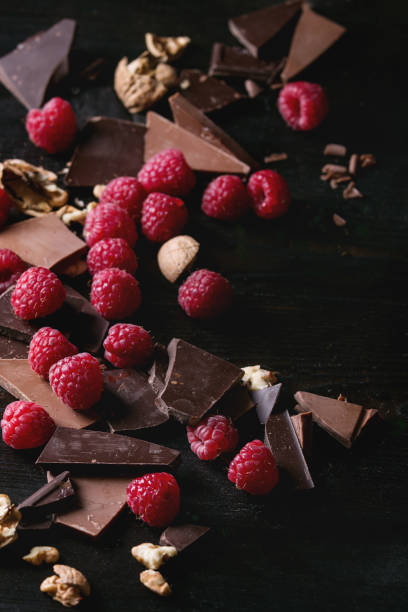 istock Variety of chopping chocolate with raspberries 668653546