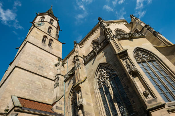 istock Protestand church with steeple in Schorndorf with worm`s eye view 668664706