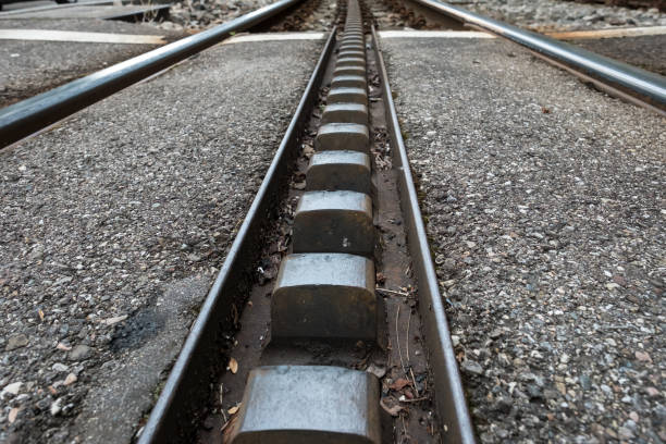 rails and gears of a rack railway in stuttgart germany - rust metal fotos imagens e fotografias de stock