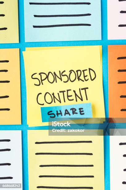 Sponsored Content Branded Ads Paid Post And Promoted Concept On Digital Marketing Vertical Concepto With Notes Stock Photo - Download Image Now