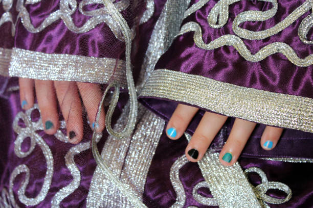 istock girl's hands in Moroccan suit 668671428