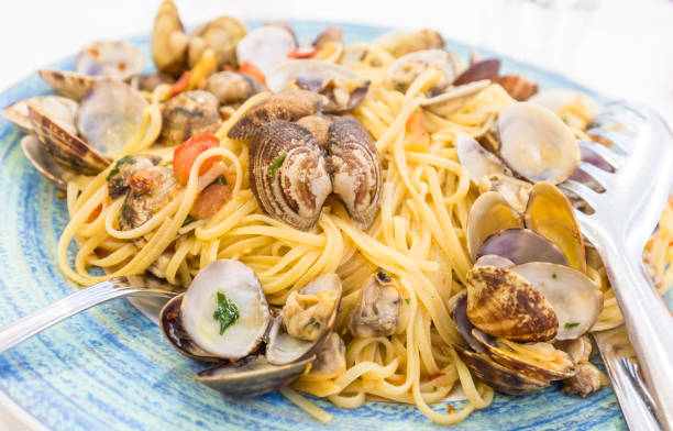 istock Real Spaghetti alle vongole in Naples, Italy 668674558