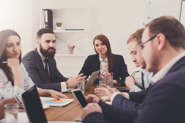 istock Business meeting. Young team in modern office 668681608