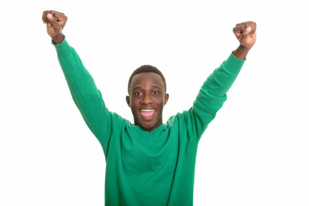 Young happy African man smiling and looking excited horizontal shot