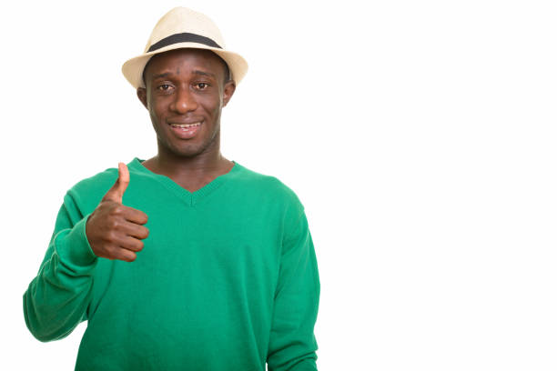 Young happy African man smiling and giving thumb up horizontal shot
