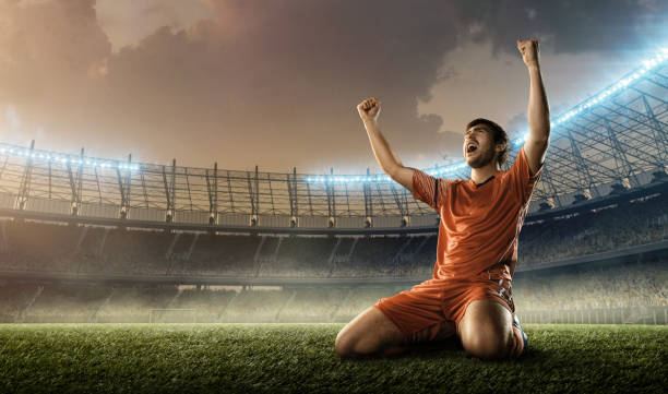 istock soccer player celebrating a victory 668688456