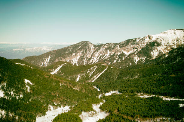 snow-covered mountains snow-covered mountains 雪 stock pictures, royalty-free photos & images