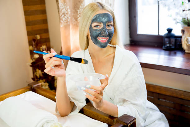 istock Girl put on face mask 668694562